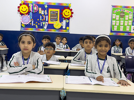 Students participating in Cambridge IGCSE learning activities